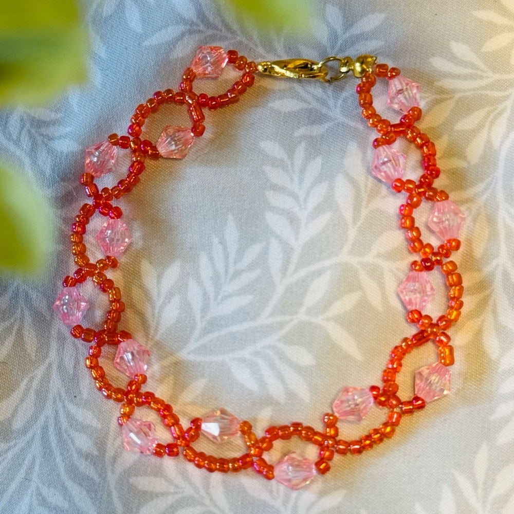 Elegant Pink and Orange Beaded Bracelet